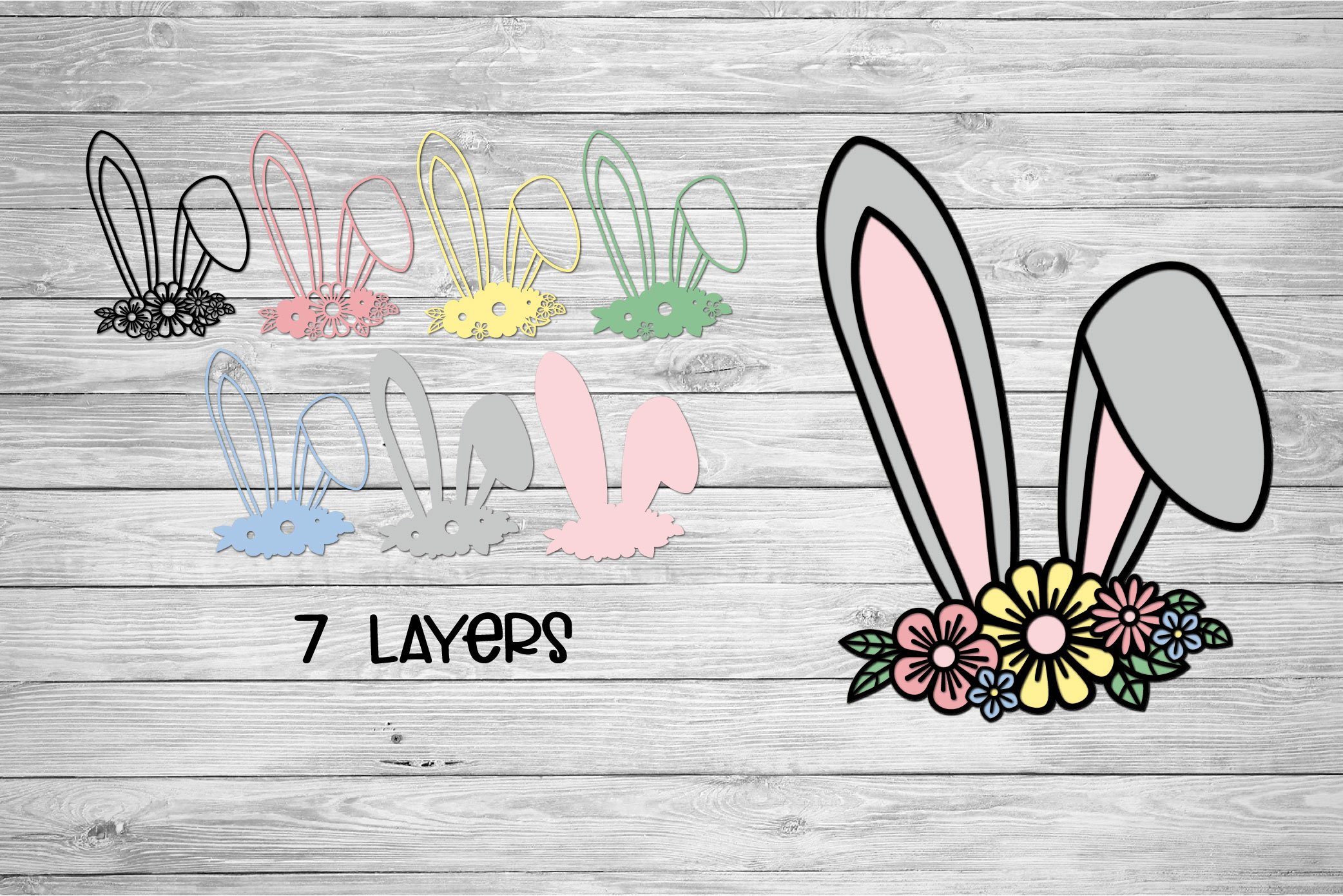Grey wooden background with the diverse of the bunny ears.