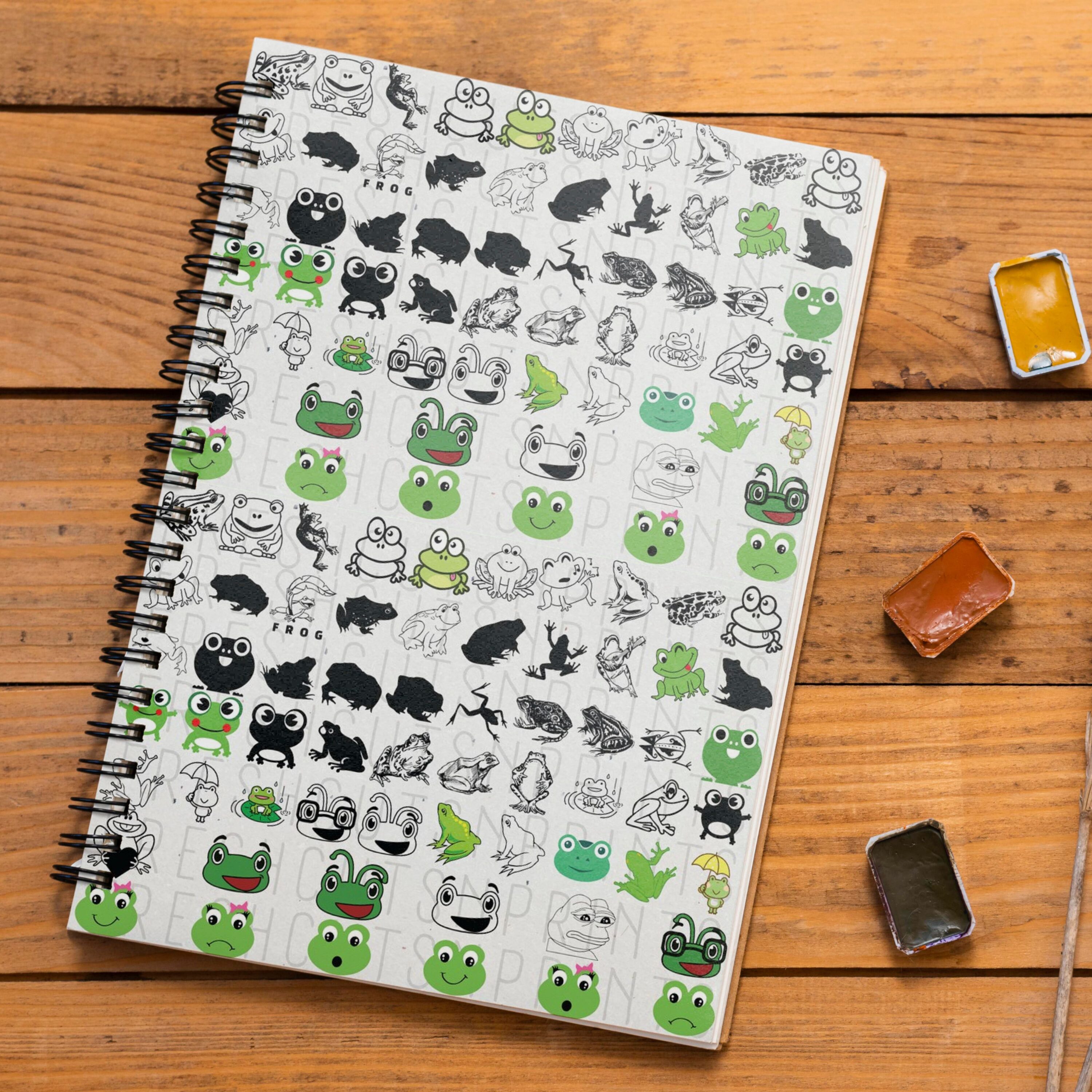 Notebook with a variety of stickers on it.