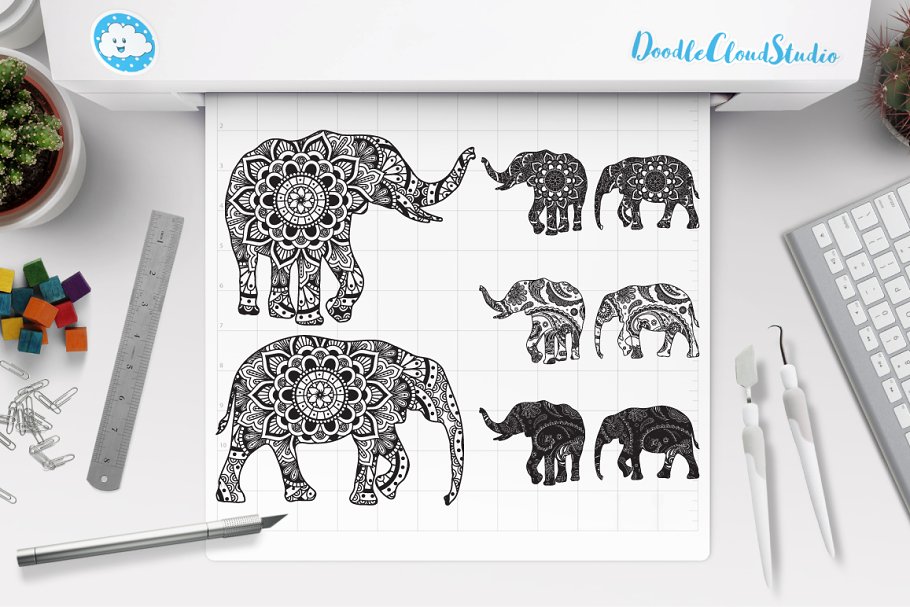 Picture of elephants on a sheet of paper.