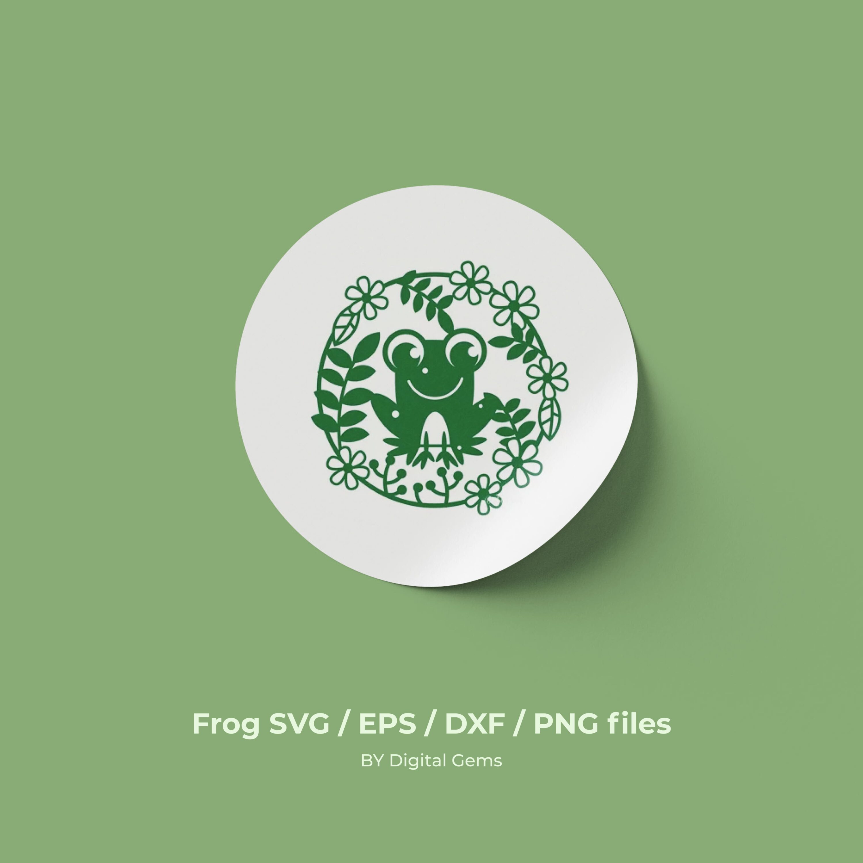 White plate with a green frog on it.