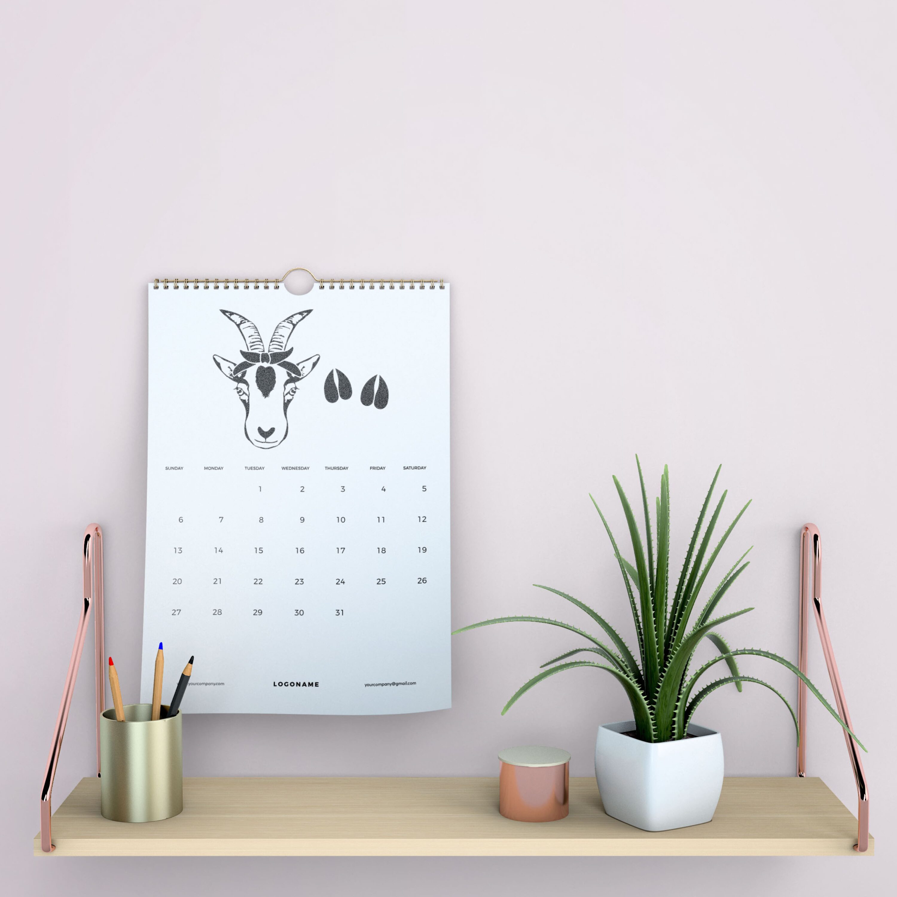 Desk with a calendar and a potted plant.