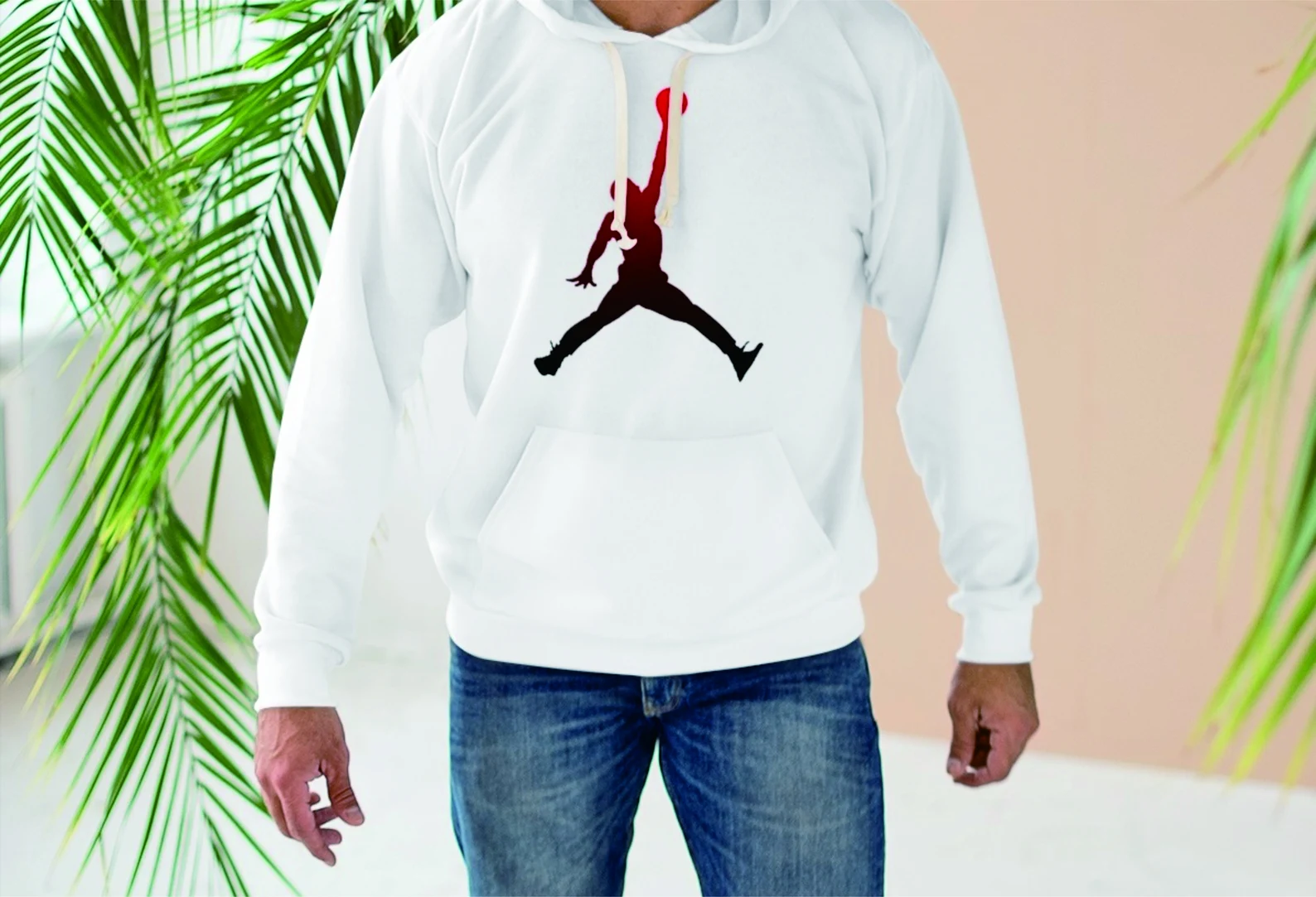Black and red Jordan on a white sweater.