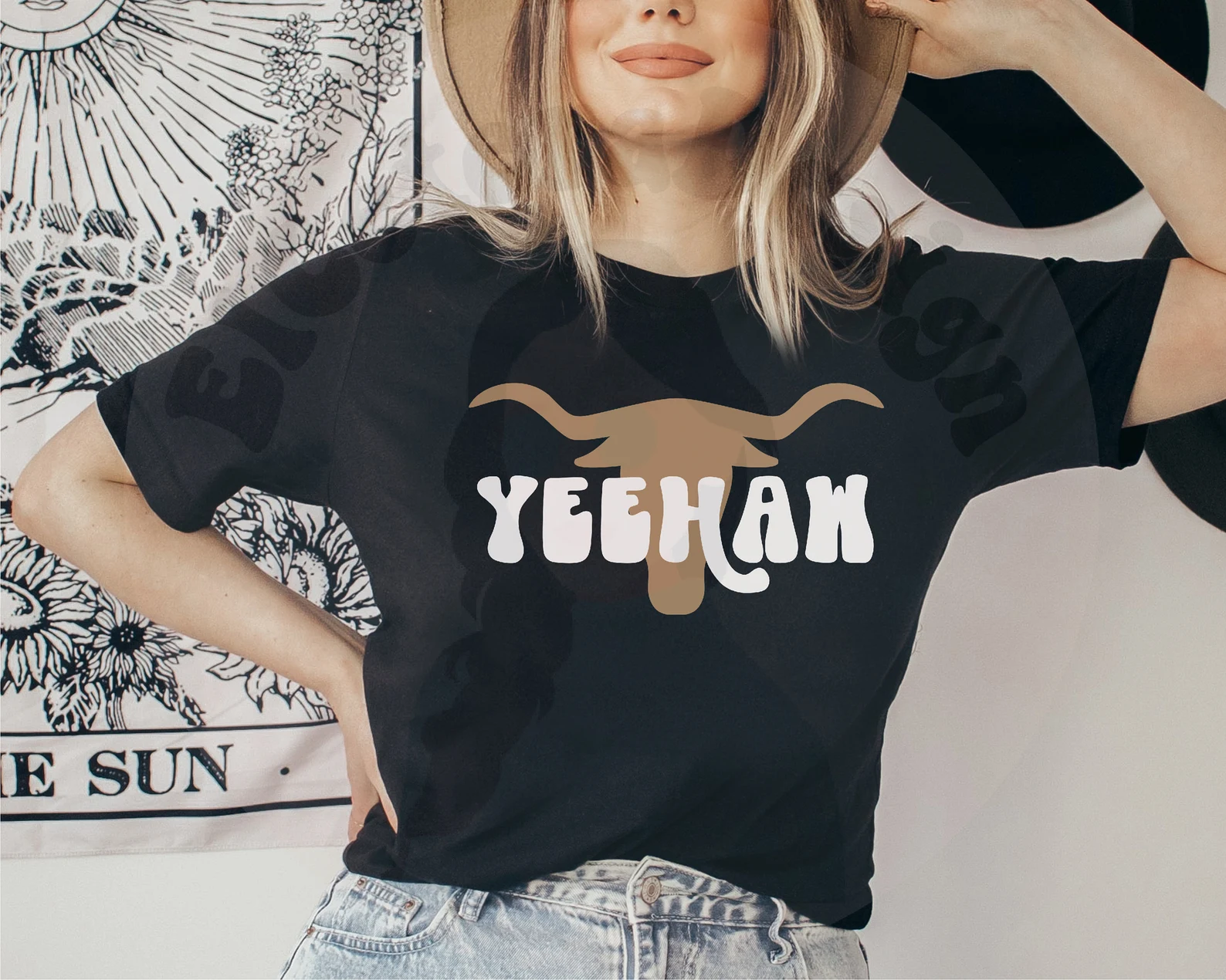 Classic black t-shirt with a gold cow and bold font.