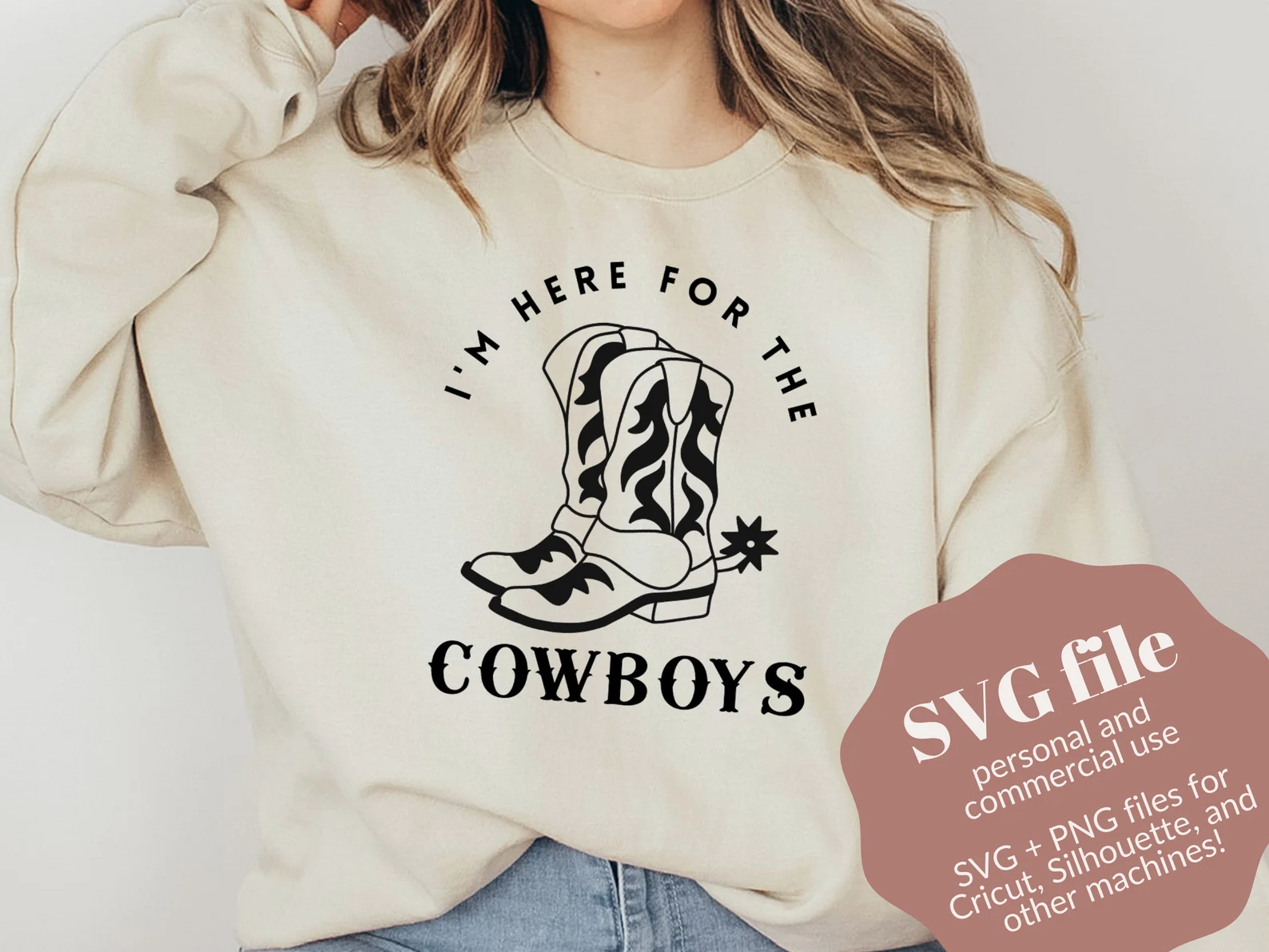 Soft white sweater with cowboys boots.