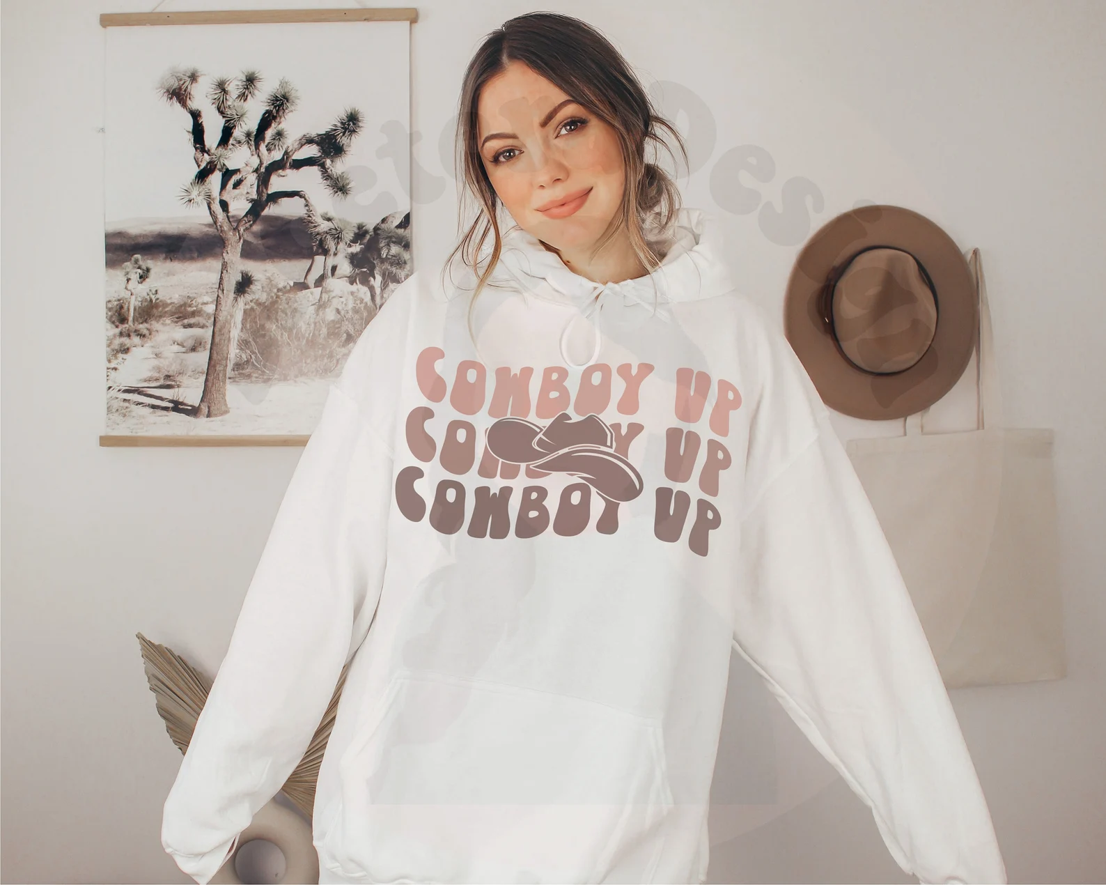 Warm white sweater with cowboys illustration.