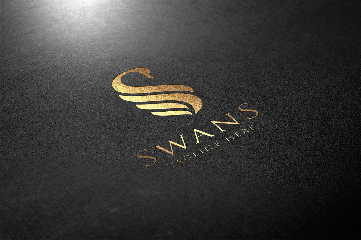 Black paper with gold swan logo.