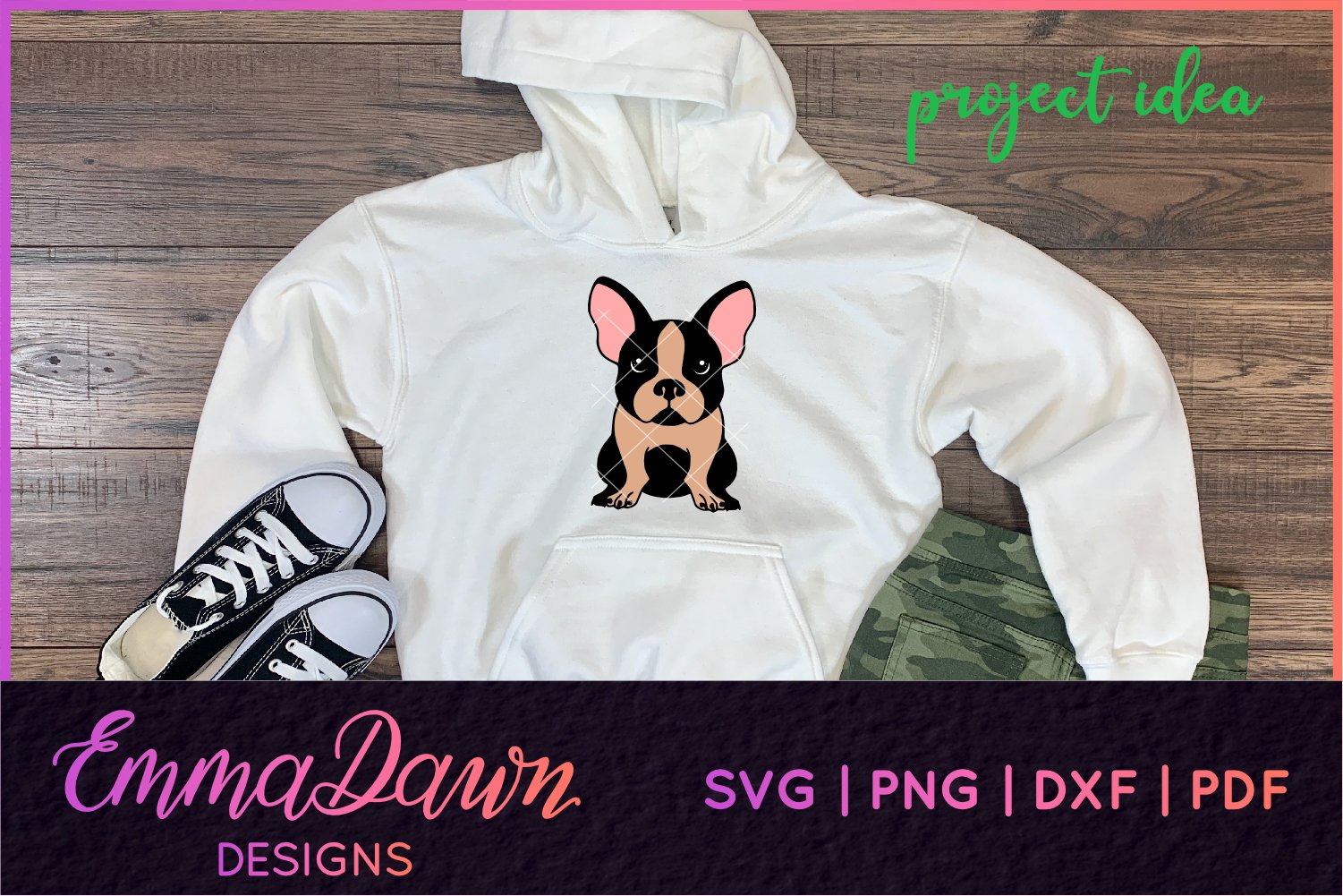 White hoodie with a black and tan dog on it.