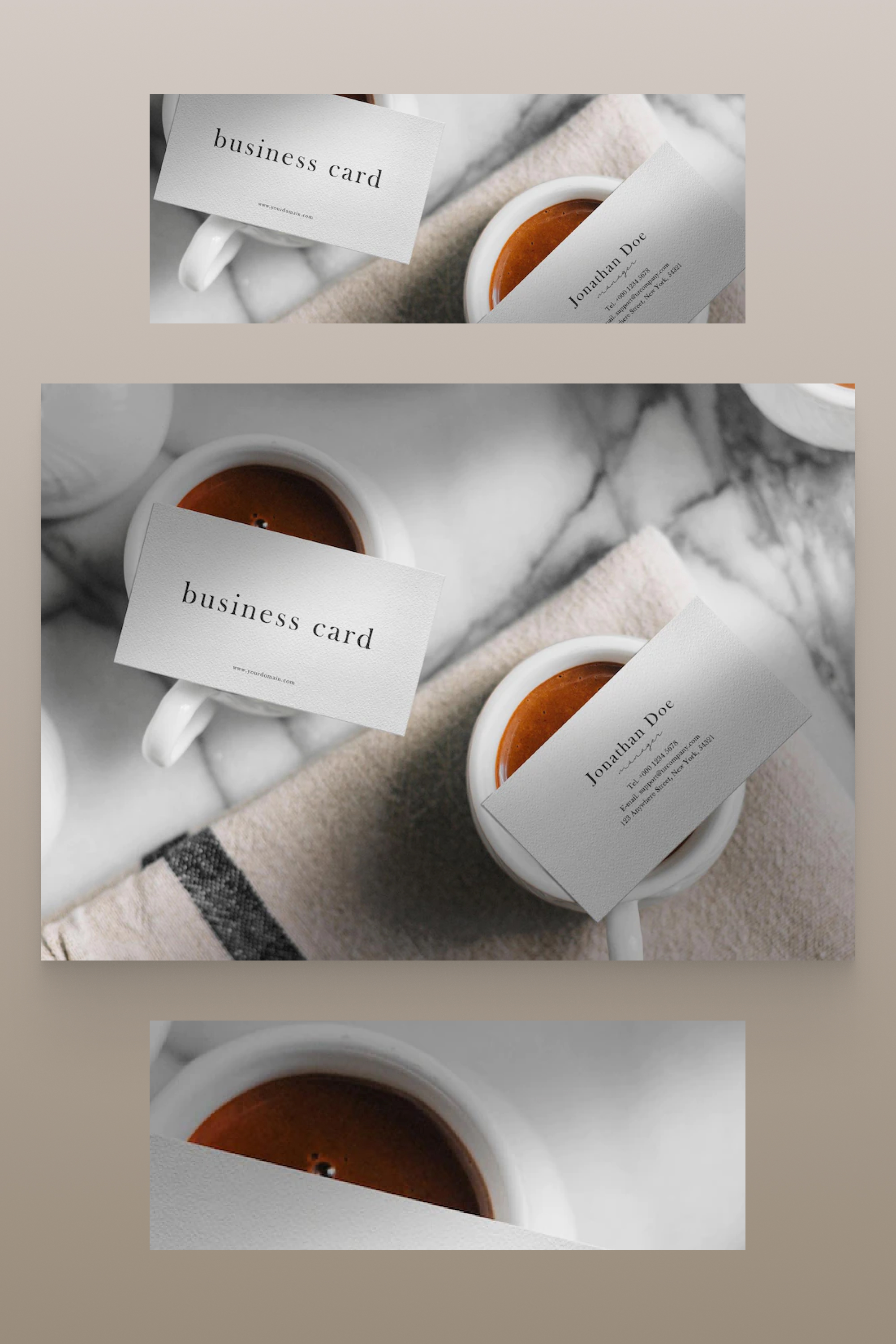 White business cards with black text on a coffee cup on a towel.