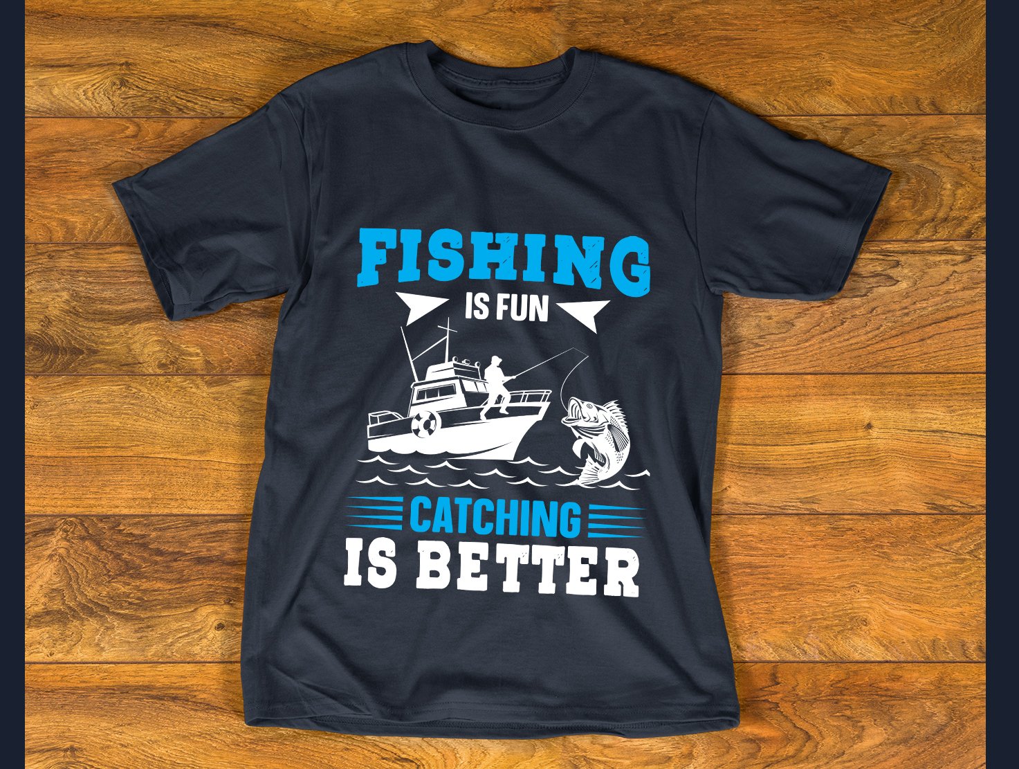 Blue fishing lettering on a black t-shirt.