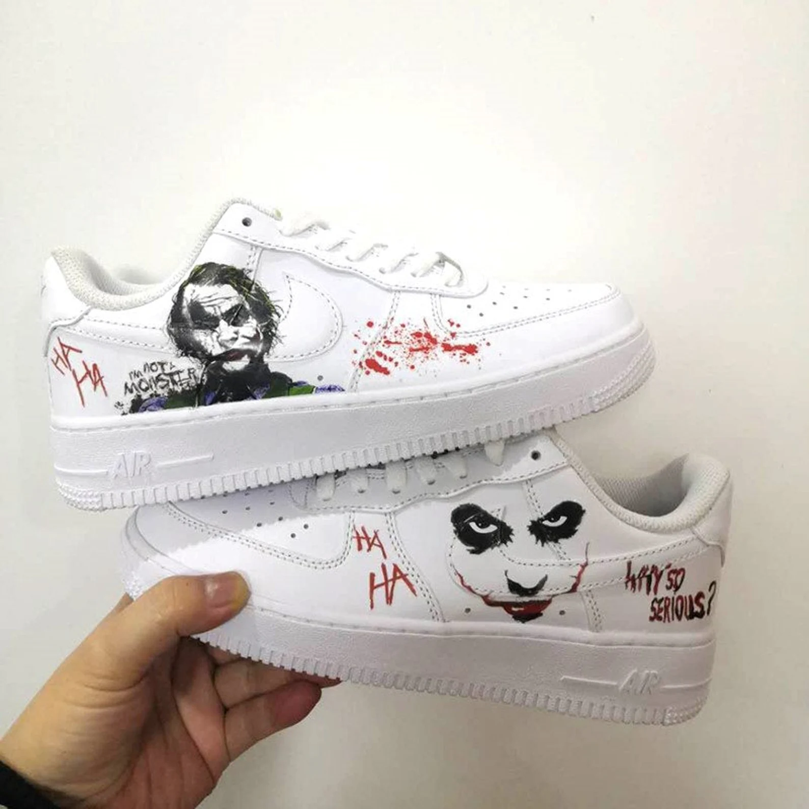 Stylish white shoes with Joker print.