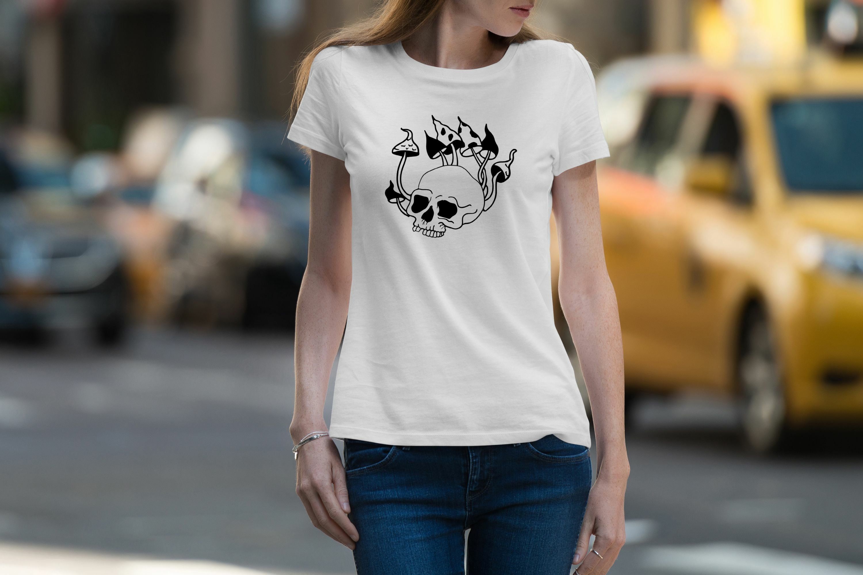 White t-shirt for women with magic mushrooms on the skull.