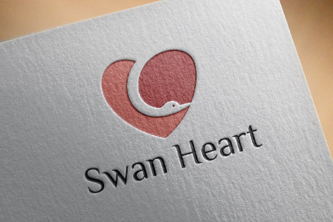 Light grey paper with swan in heart shape logo.
