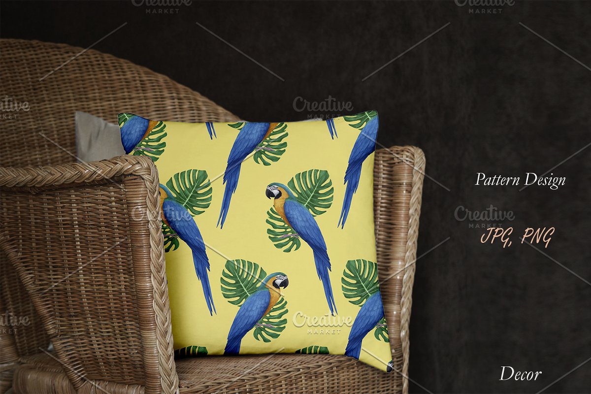 Yellow pillow with parrot design.