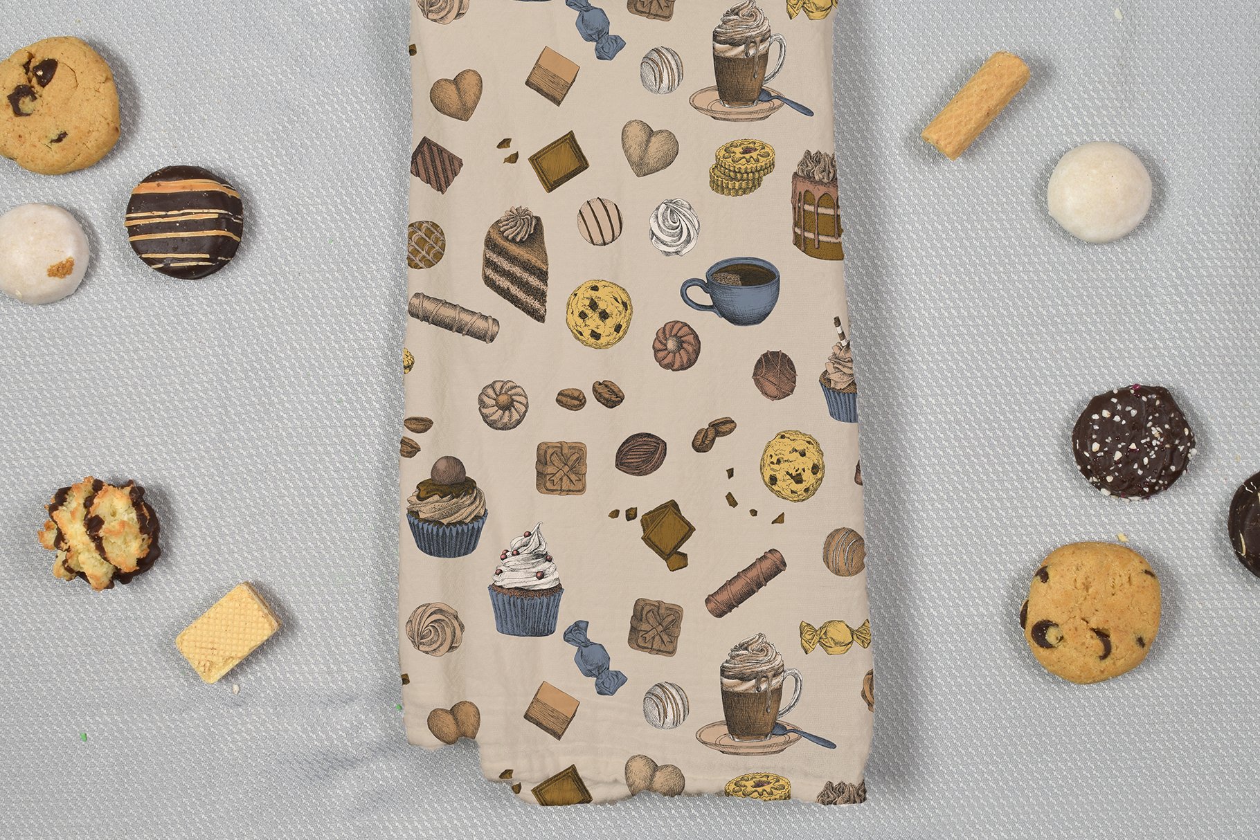 Tasty cupcakes on a fabric.