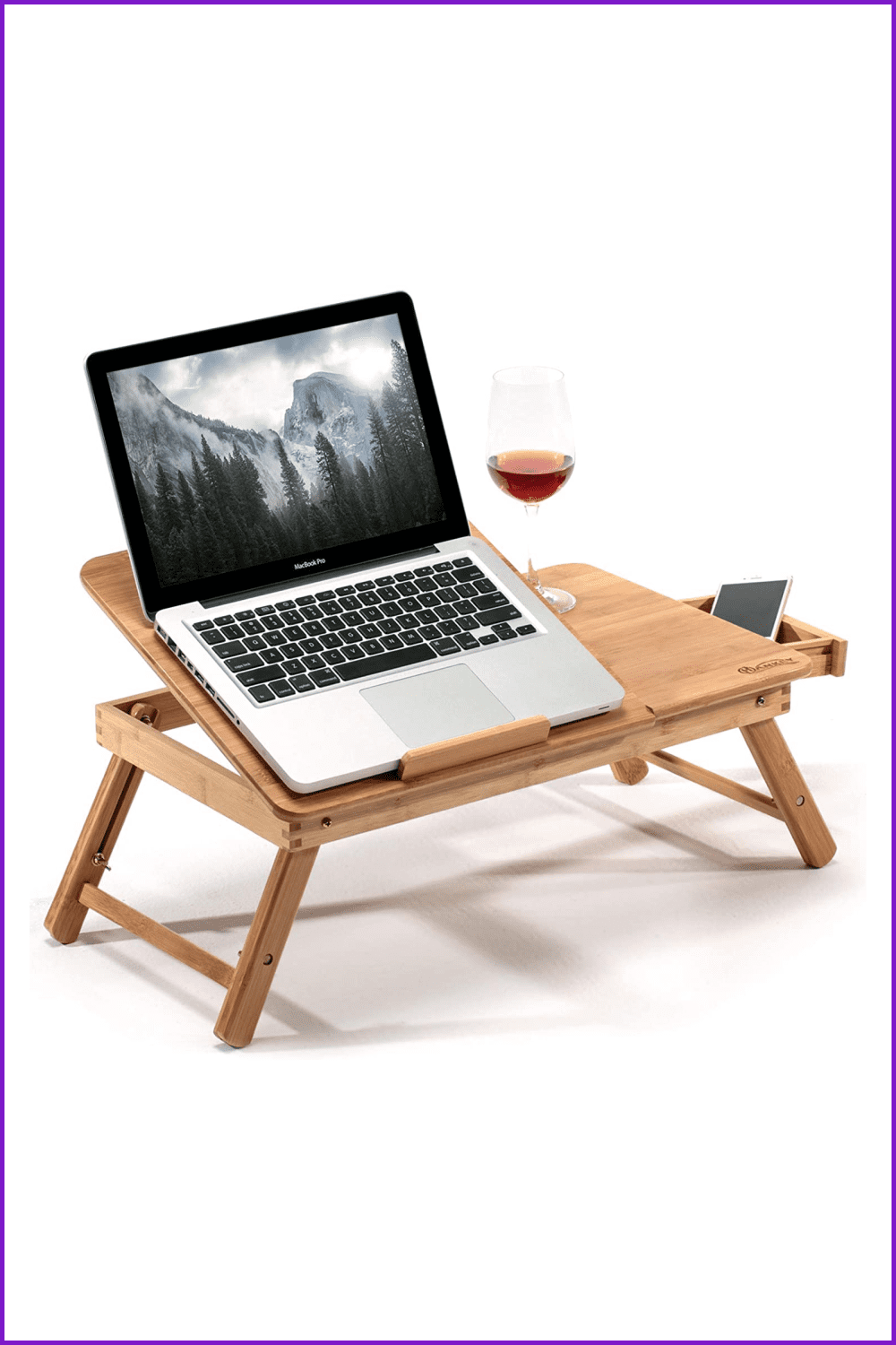 Wooden stand-table with a laptop on it.