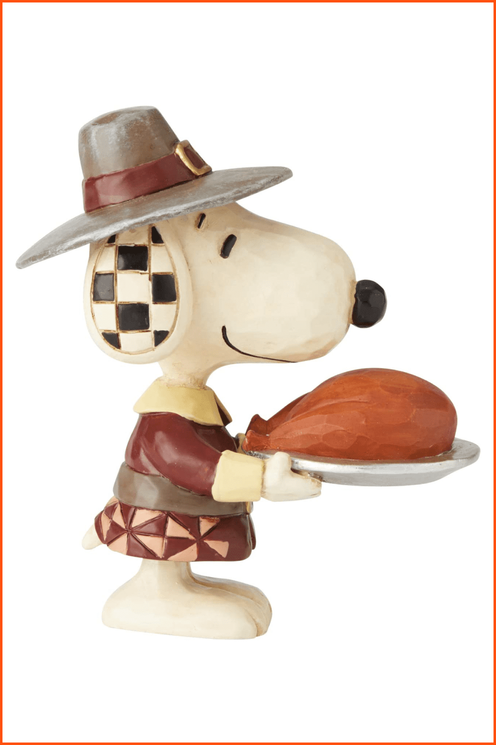 Clay Snoopy dog in a hat and with a turkey on a plate.