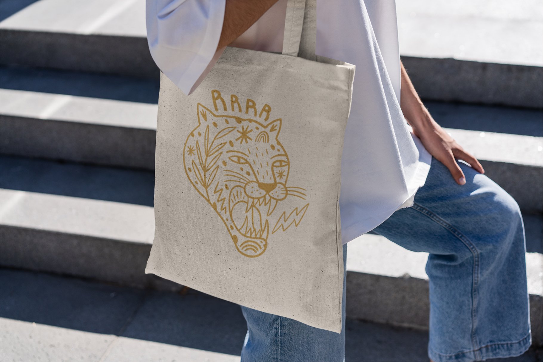 White eco bag with a gold dragon.