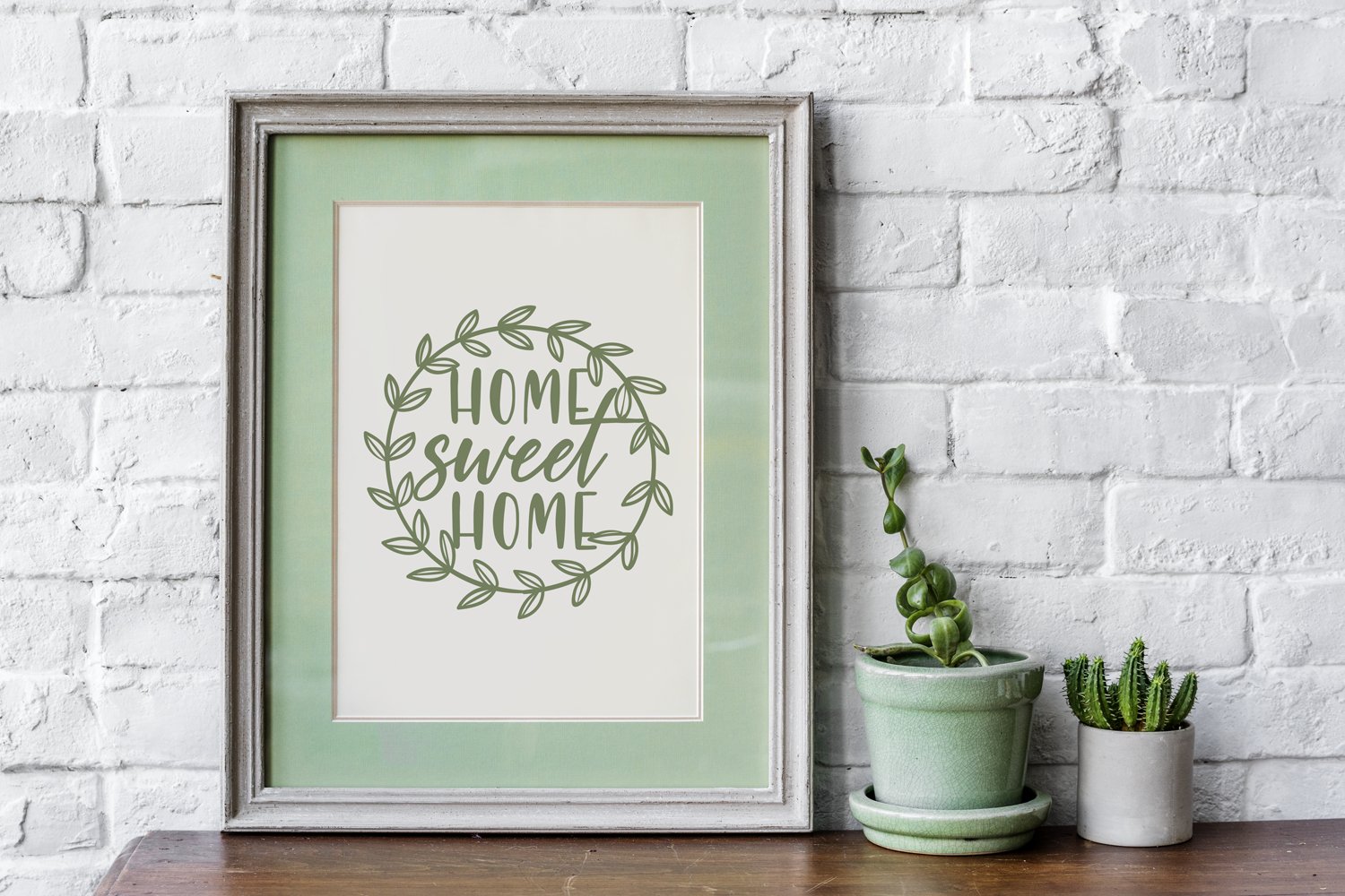 Mentol poster with wreath and quote.