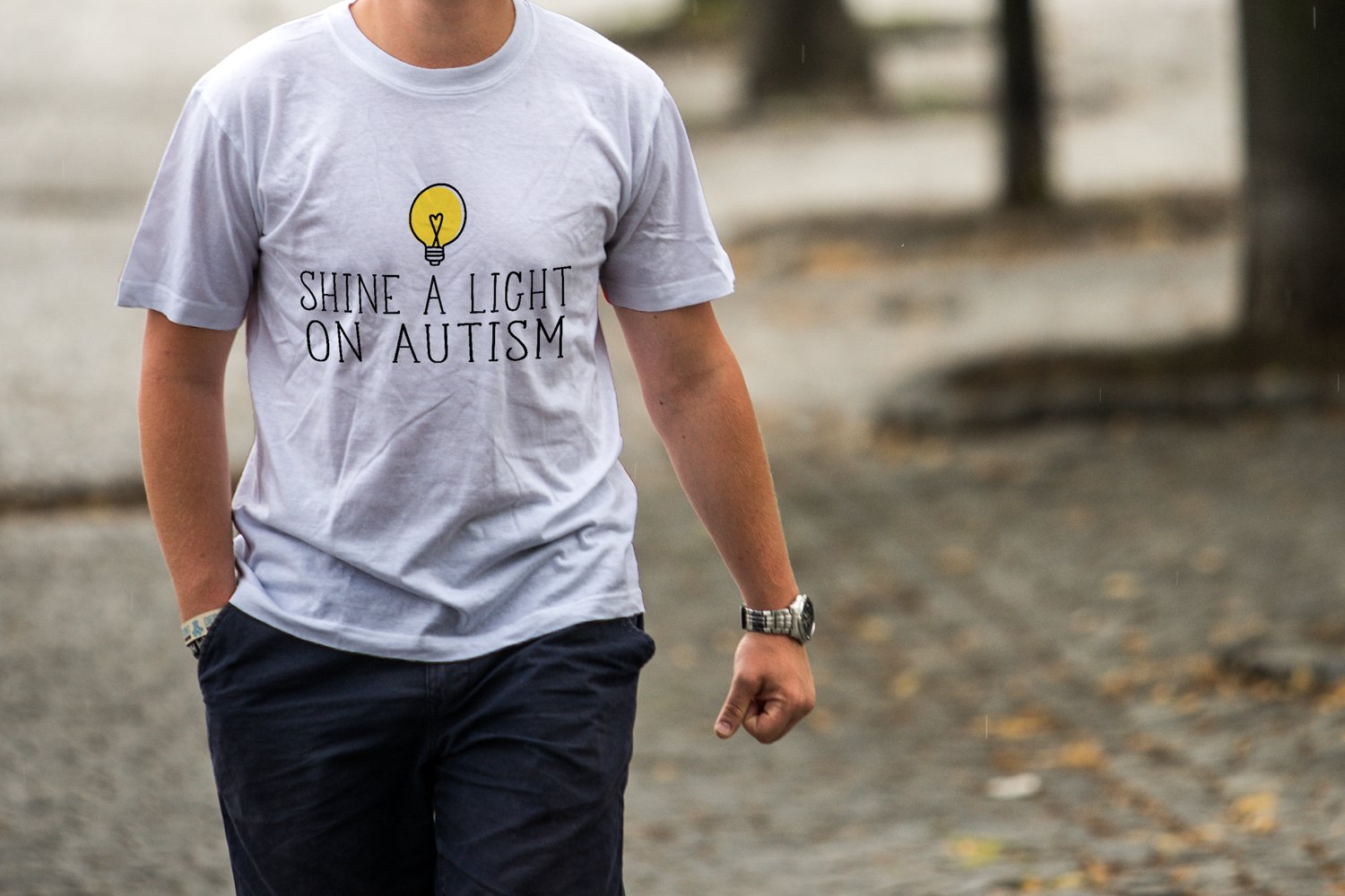 Classic white t-shirt with minimalistic autism graphic.