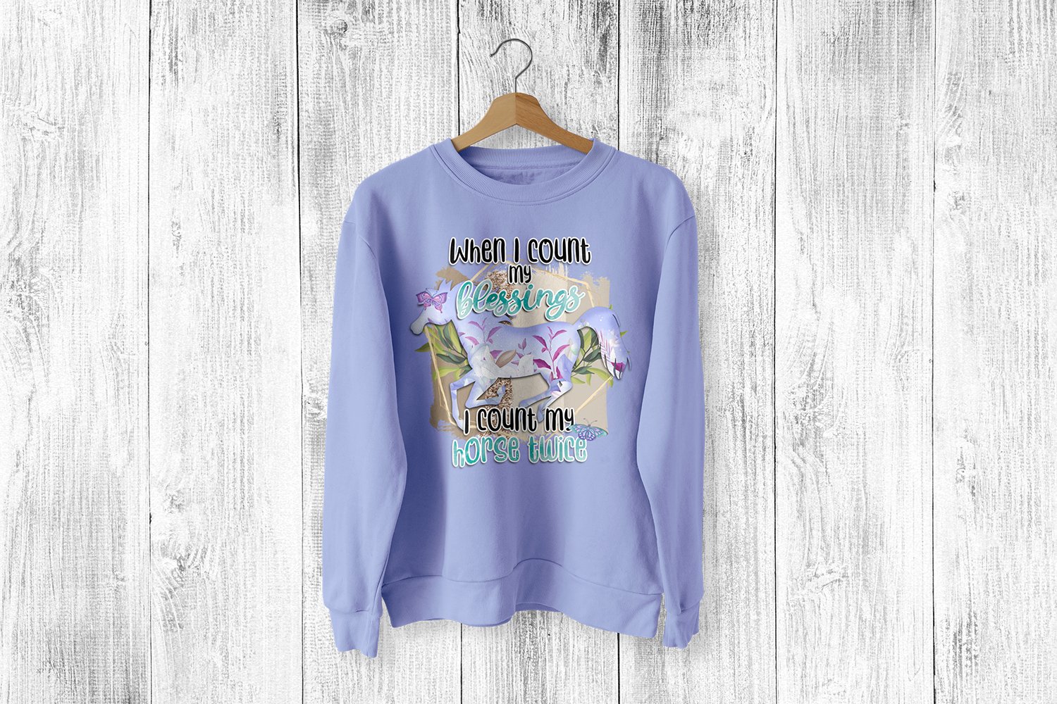 Lilac sweatshirt with big horse quote.