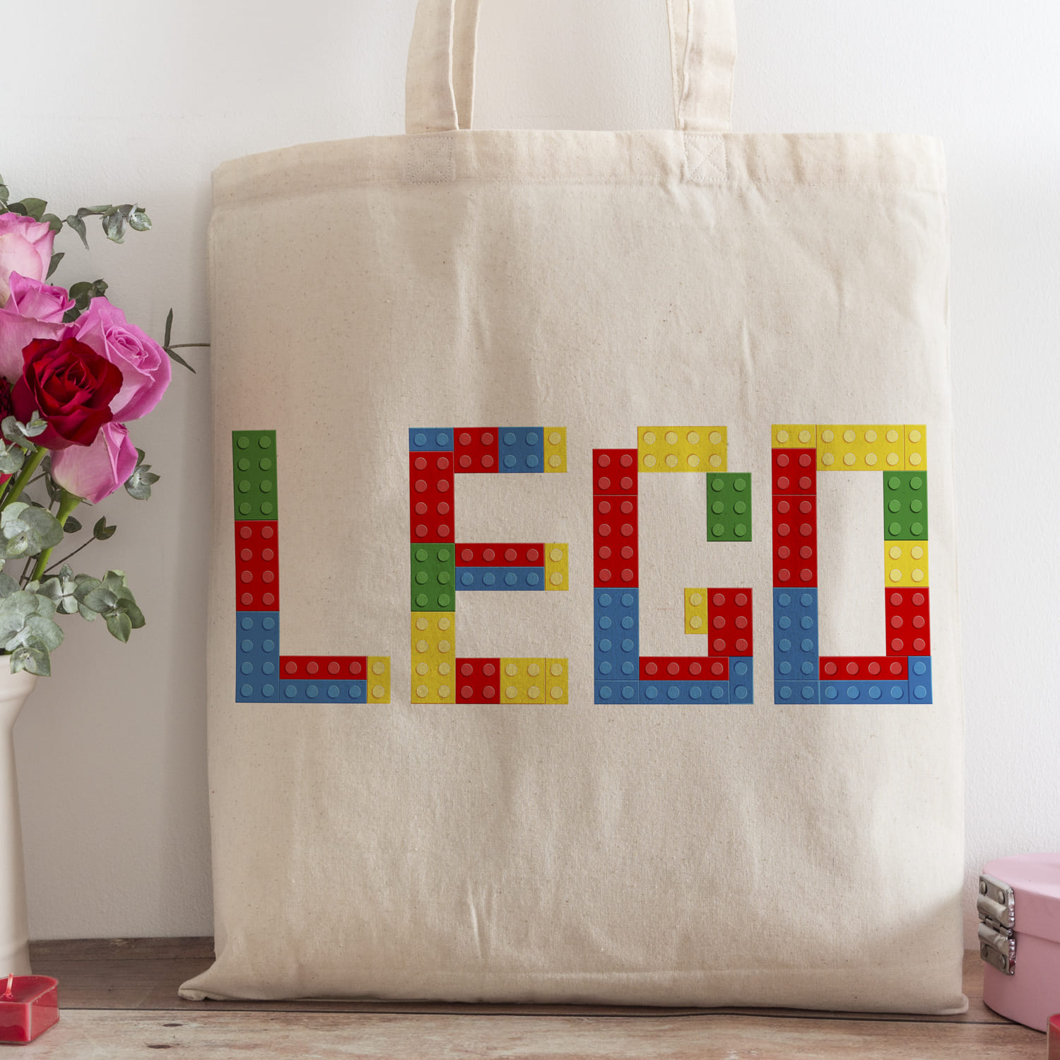 Lego brick svg design on the shopping bag.