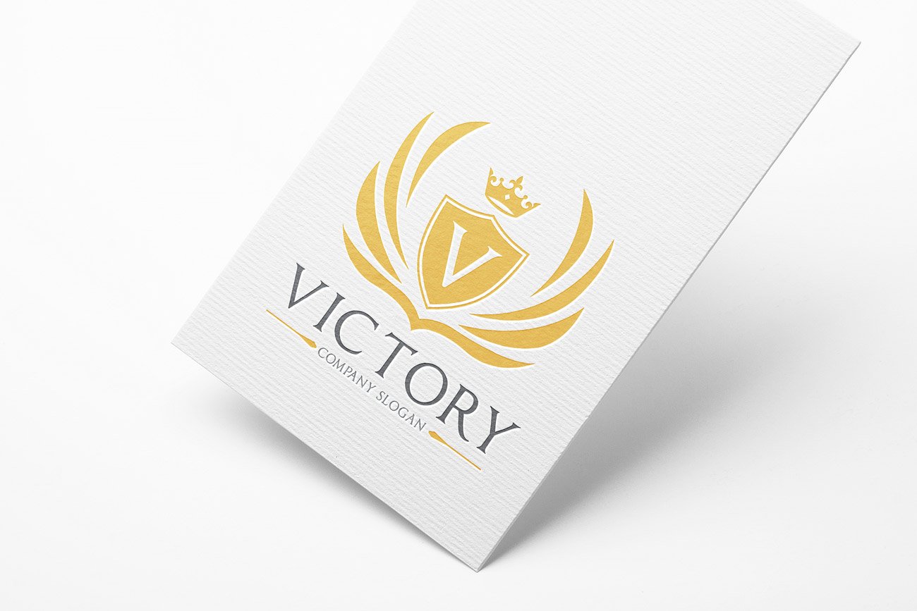 White paper with gold letter logo.