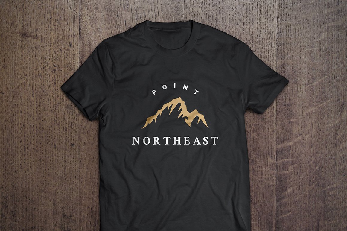 Black t-shirt with gold mountains.