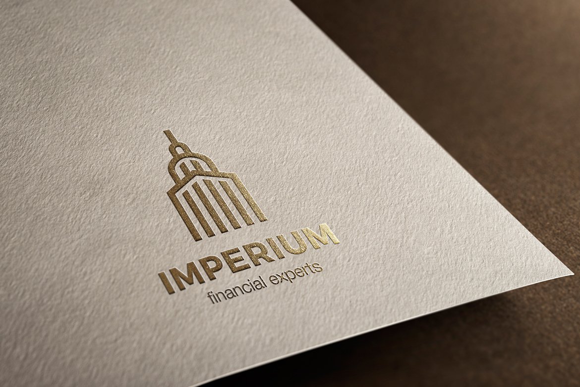 Matte beige paper with gold logo in Empire State building style.