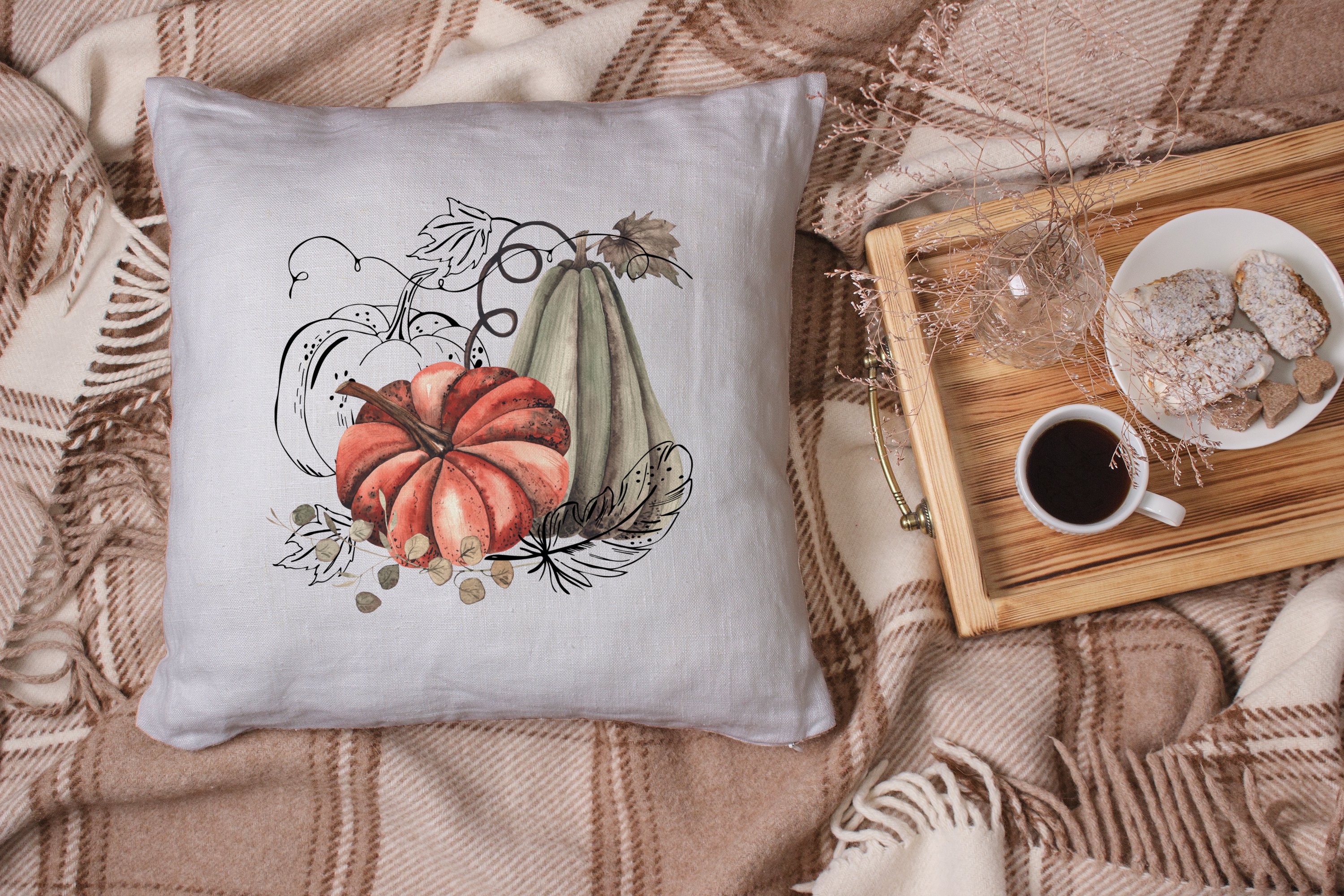 Decorate grey pillow with the orange pumpkin.