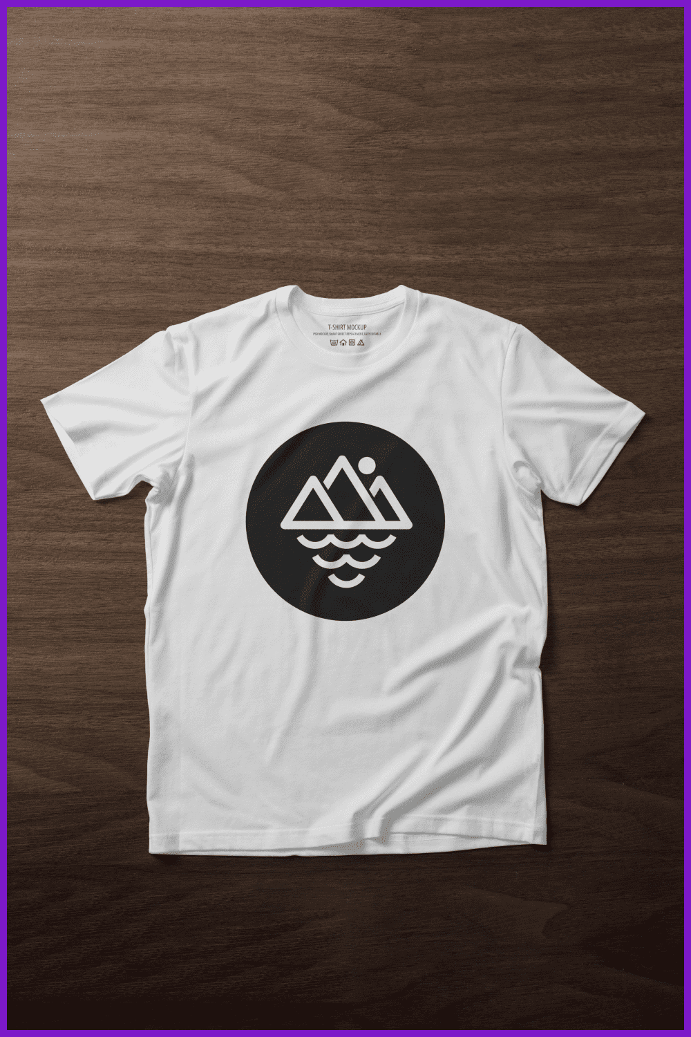 White T-shirt with a black circle with a sketch of the sea and mountains.