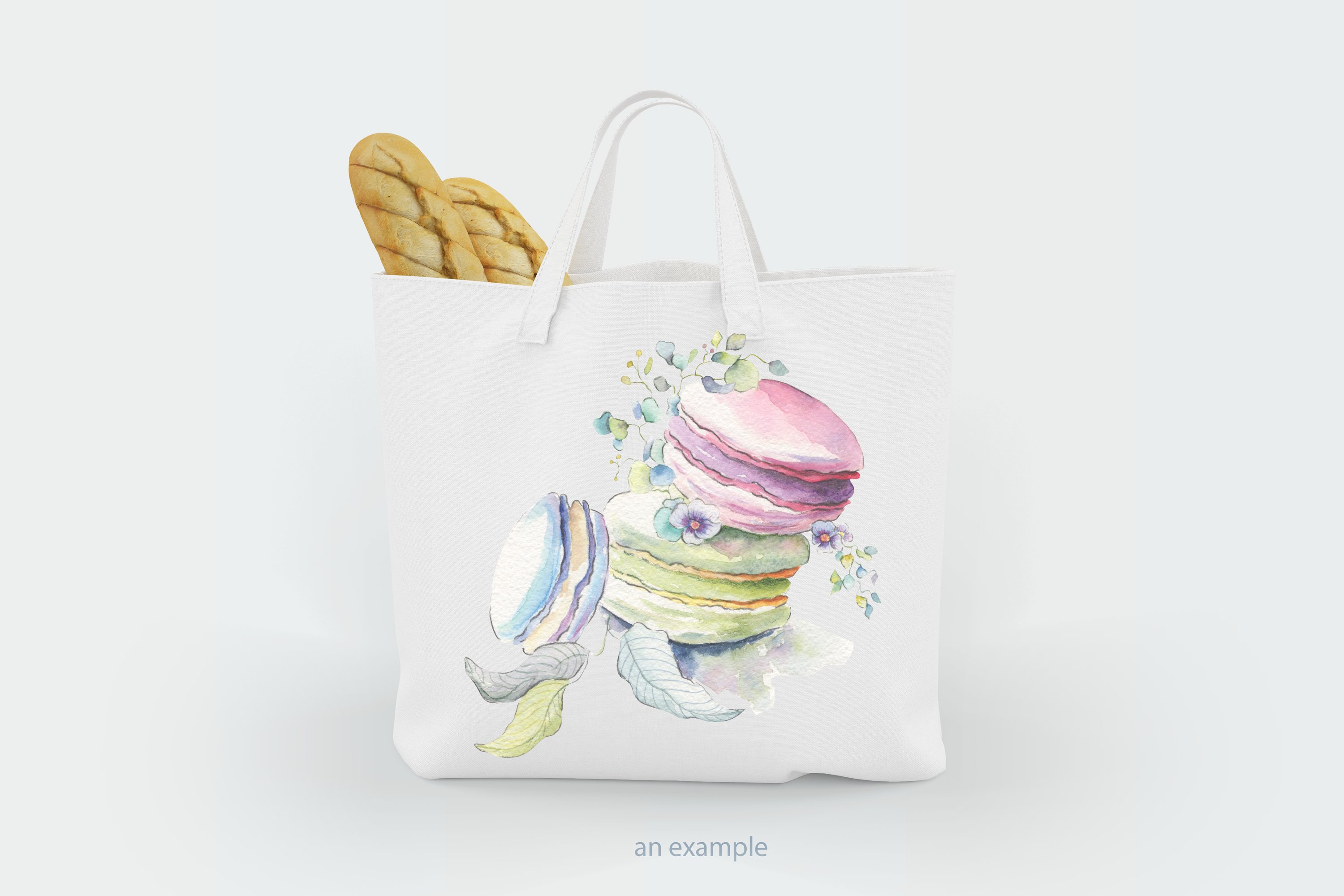 White eco bag with pastel macaroons illustration.