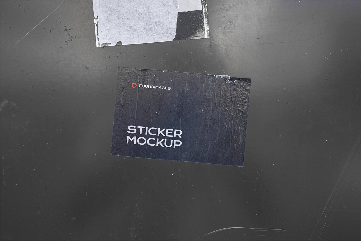 Image of crumpled black sticker.