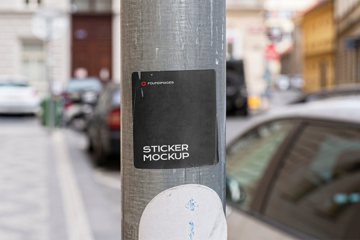 Image of a colorful torn black sticker.