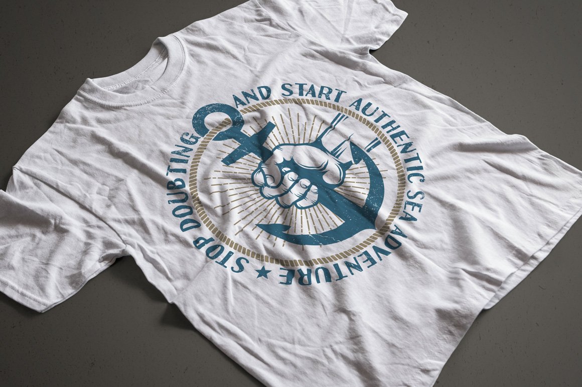 White t-shirt with a big classic anchor illustration.