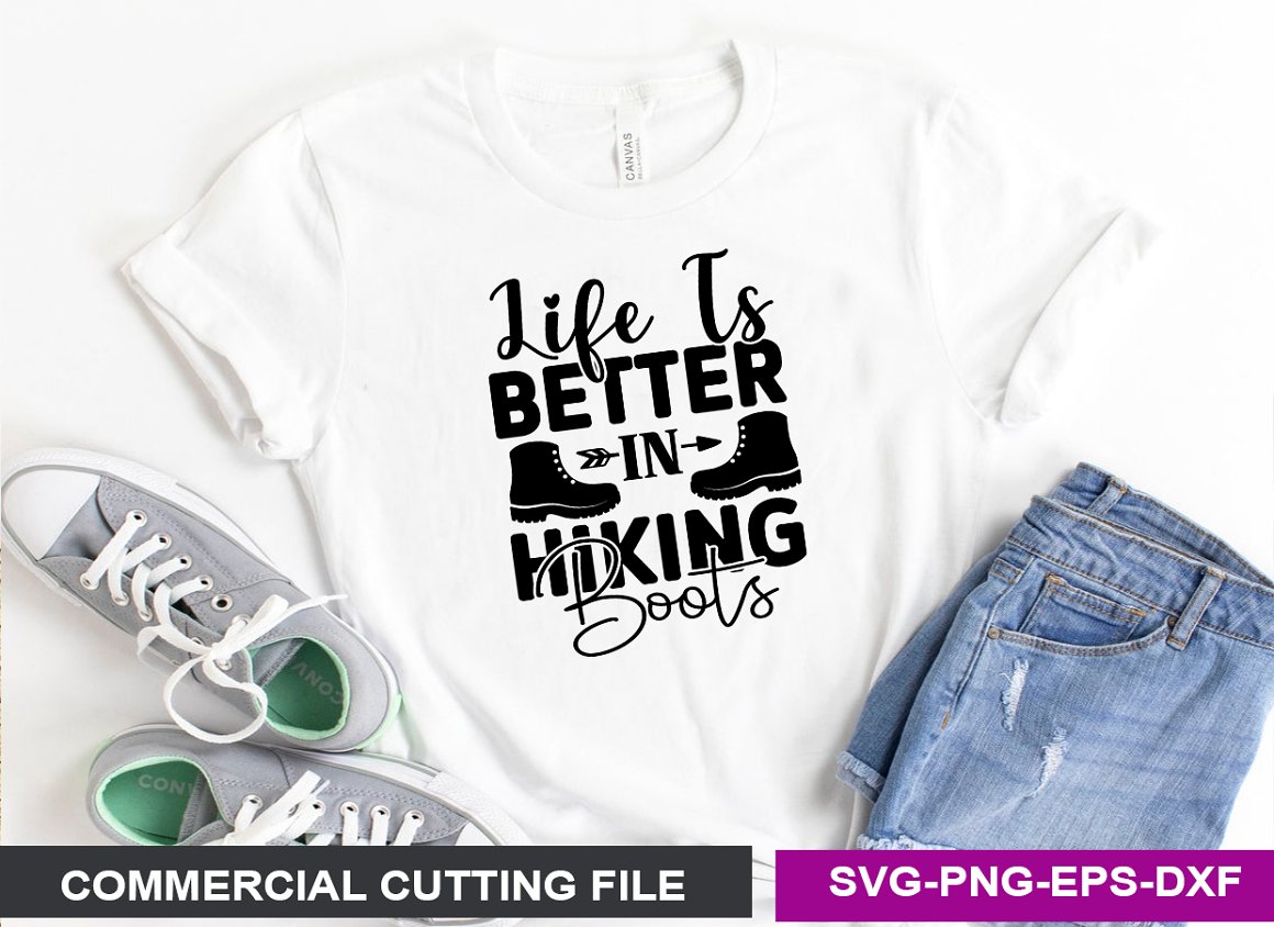 White T-shirt with the lettering "Life is better in hiking boots".