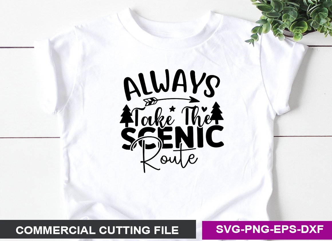 White T-shirt with the lettering "Always take the scenic route".