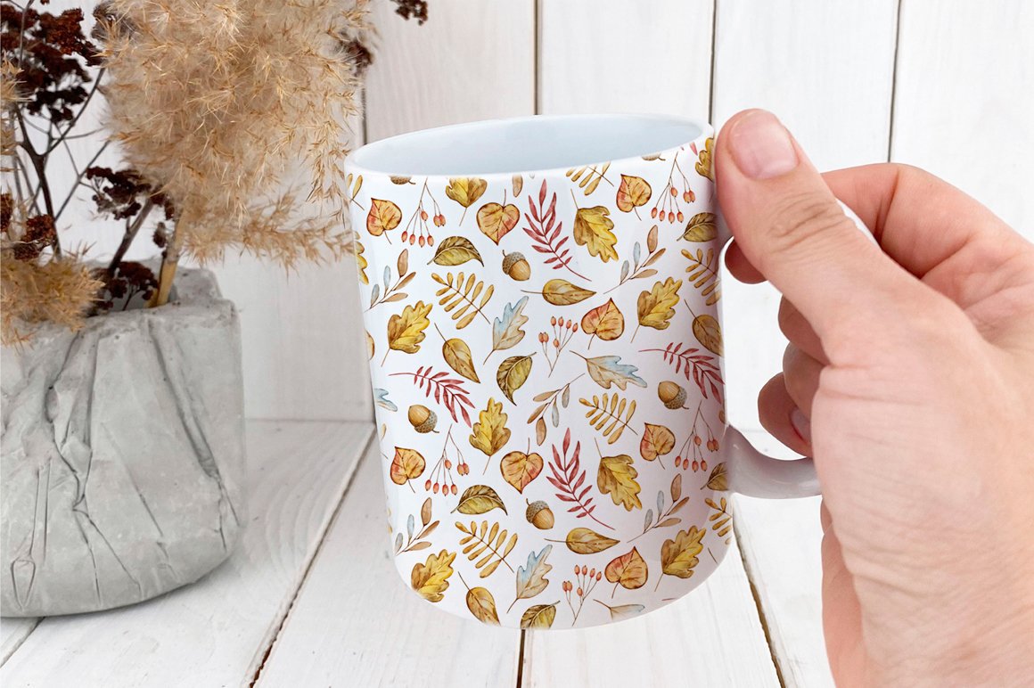 Big tea cup with an autumn illustration.
