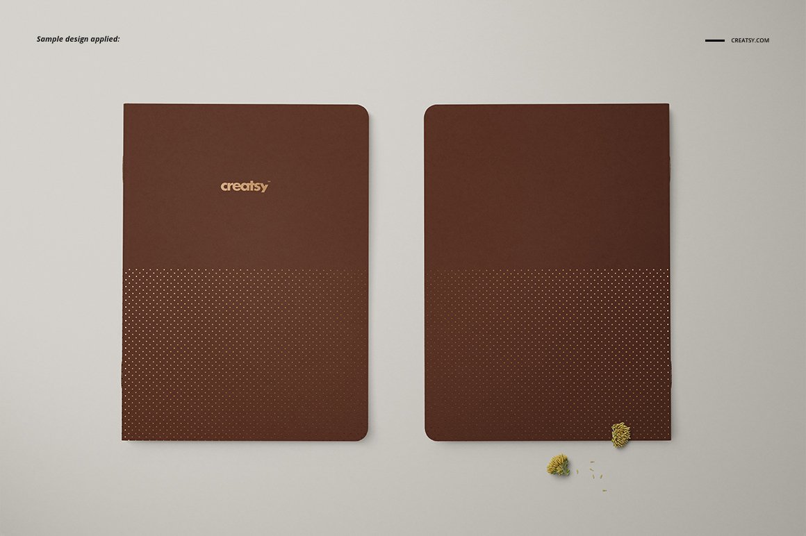 Pictures of the front and back of the a5 classic notebook with a charming design.