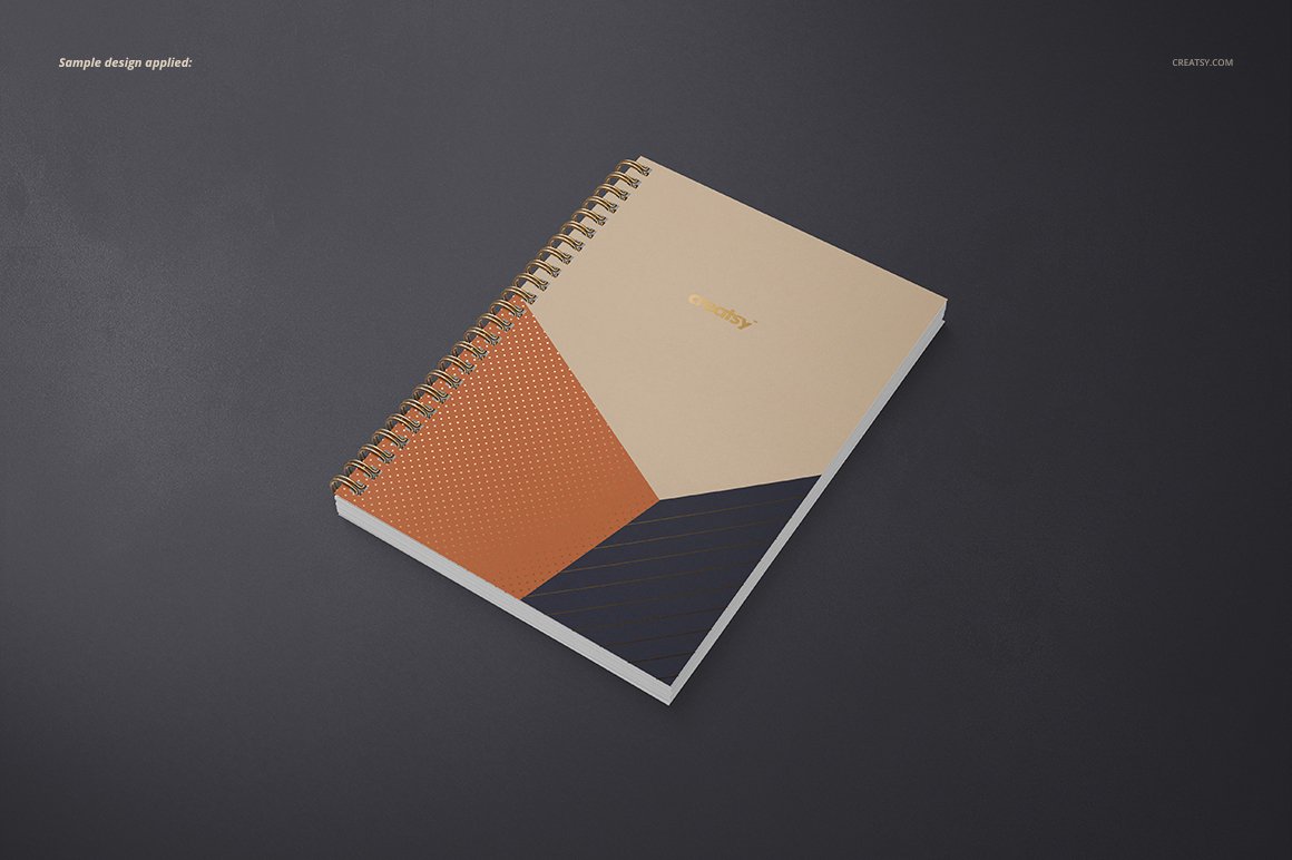 Images of a a5 spiral notebook with a lovely design on a black background.