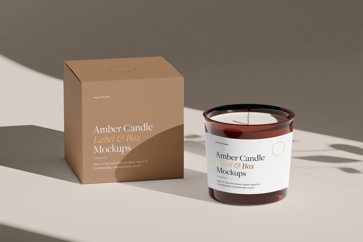 Amber glass candle with white label and beige box with the lettering "Amber Candle Label & Box Mockups".