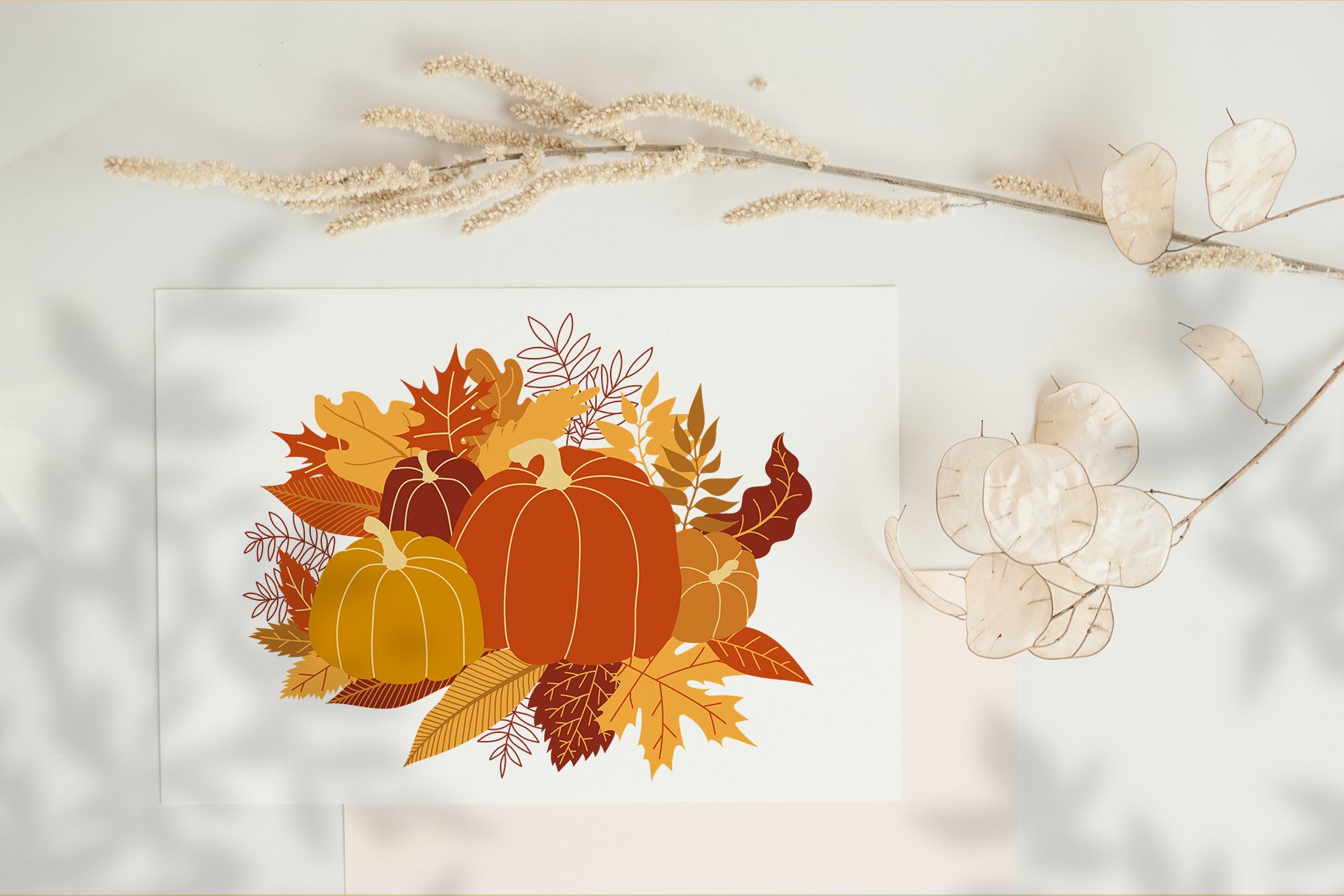 Beautiful fall composition with pumpkins and leaves.