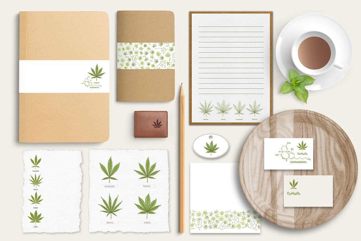 A set of 2 notebooks and business cards featuring cannabis leaves.