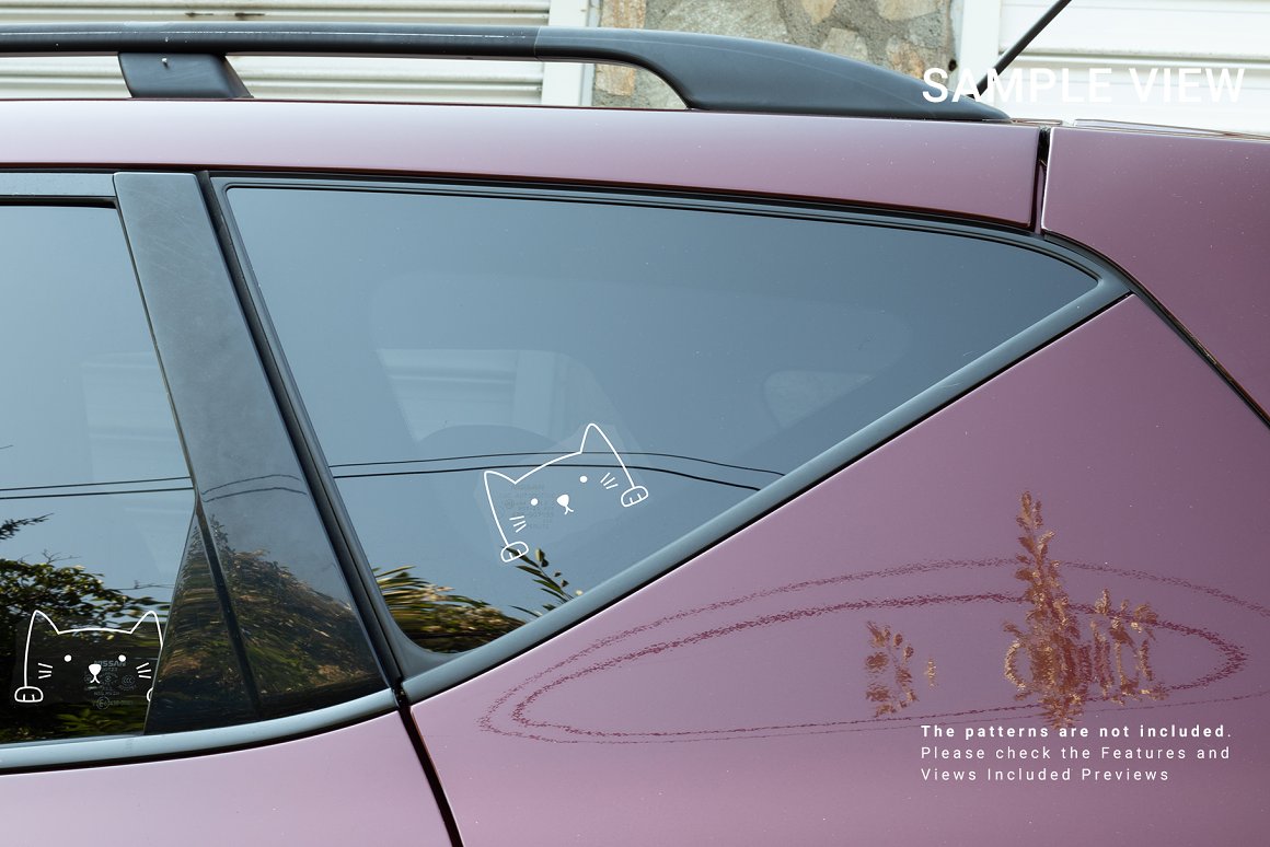 Photo of a car with a wonderful sticker with pictures of a cat.