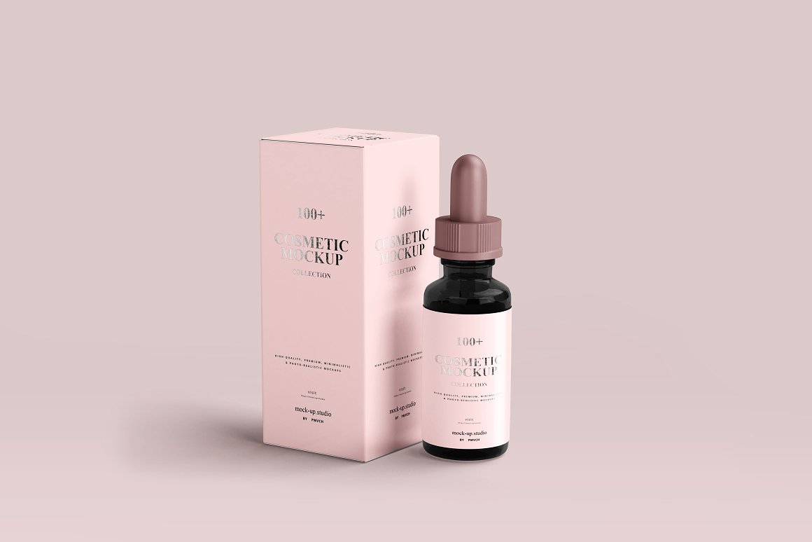 A dark glass serum with a pink label and a brown pipette and a pink box for it.