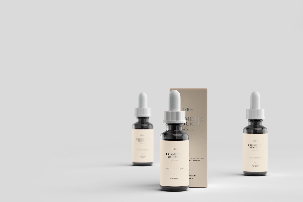 2 different dark glass serums with a beige label and a brown pipette.