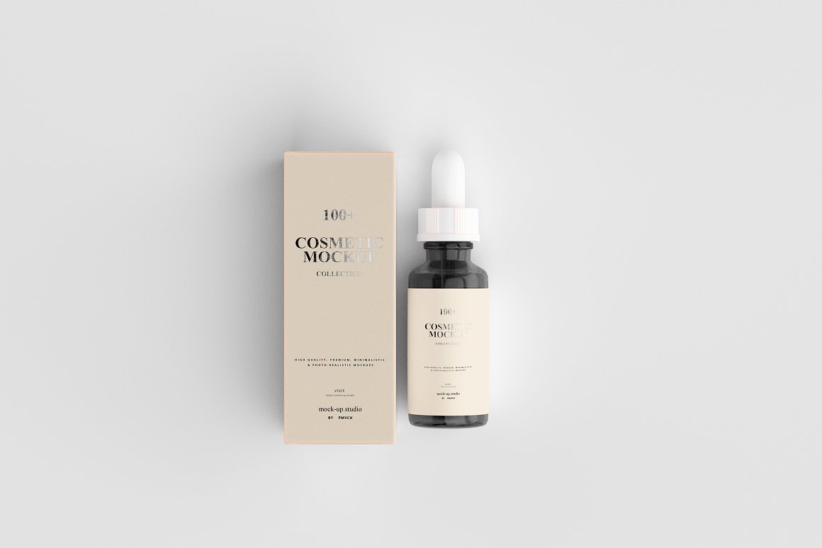 A dark glass serum with a beige label and a white pipette and a beige box for it.