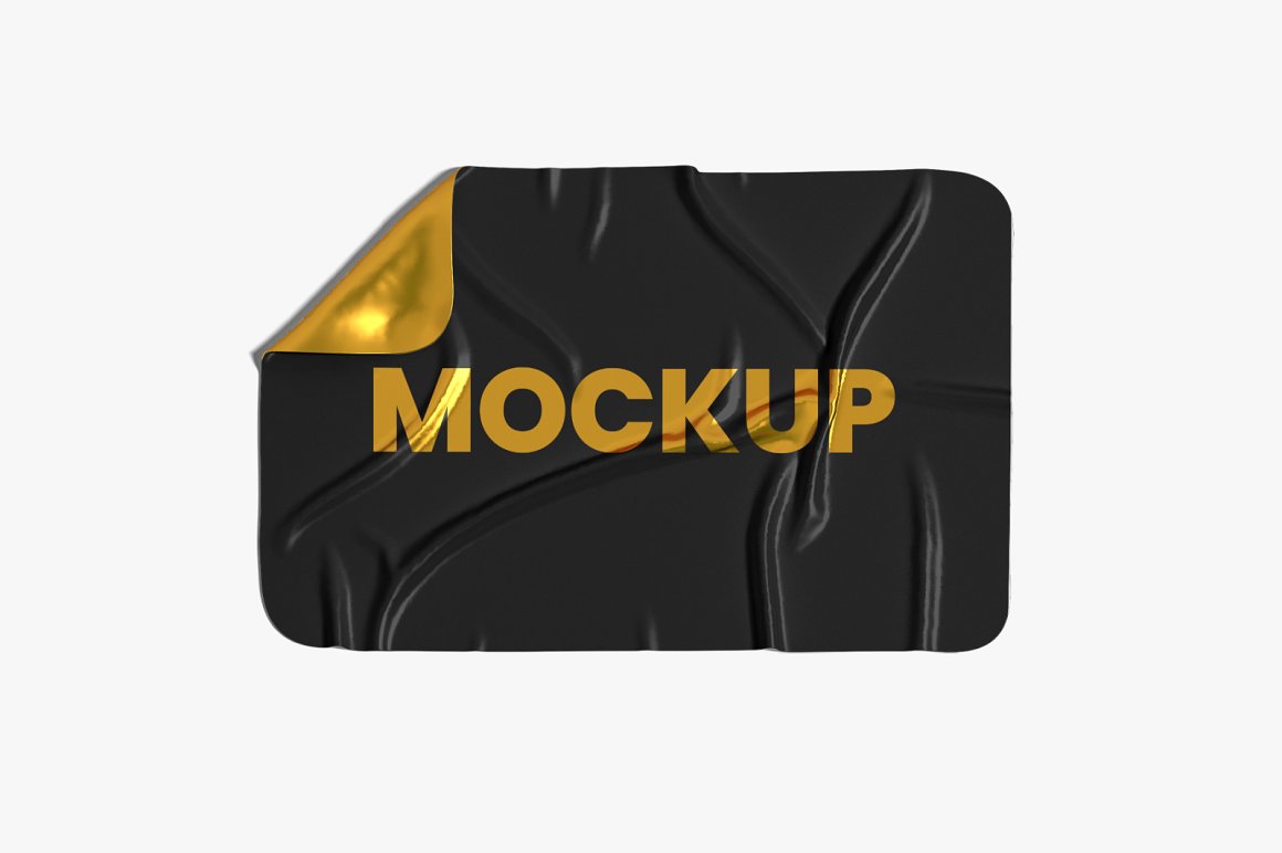 Image of a colorful crumpled sticker in gold and black.