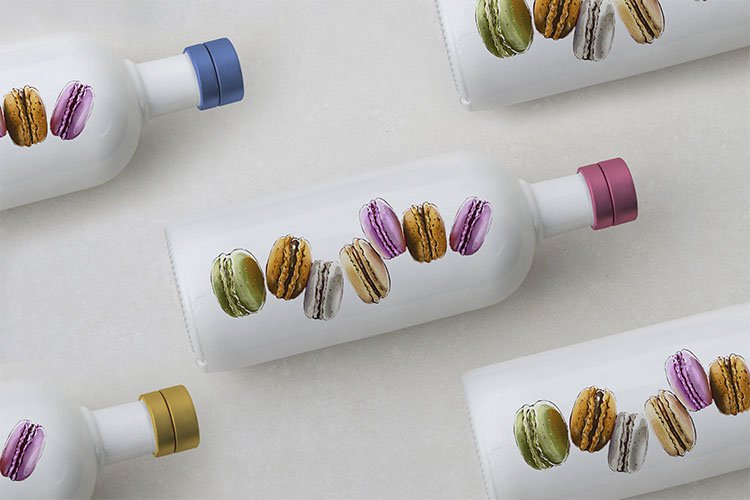 White bottles with macaroons.