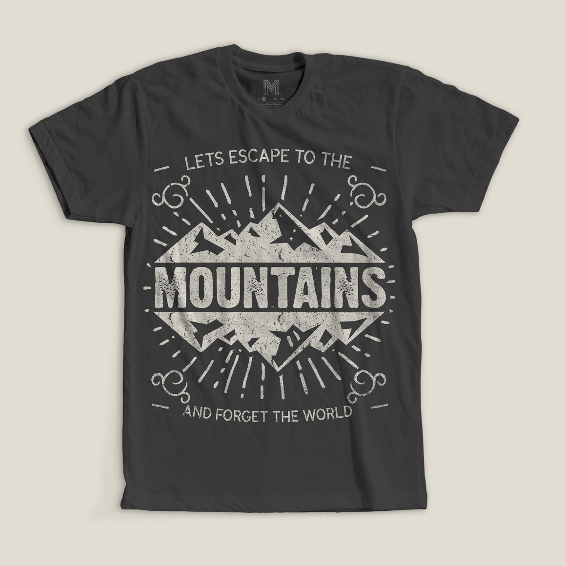 Dark grey t-shirt with the grey lettering "Let's escape to the mountains and forget the world".