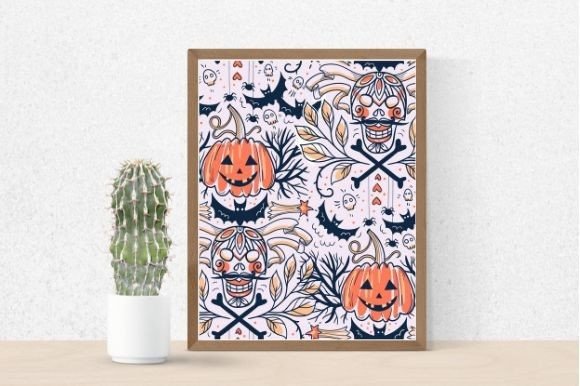 Picture with pumpkins, bats on a white background in a brown frame and a cactus in a pot.